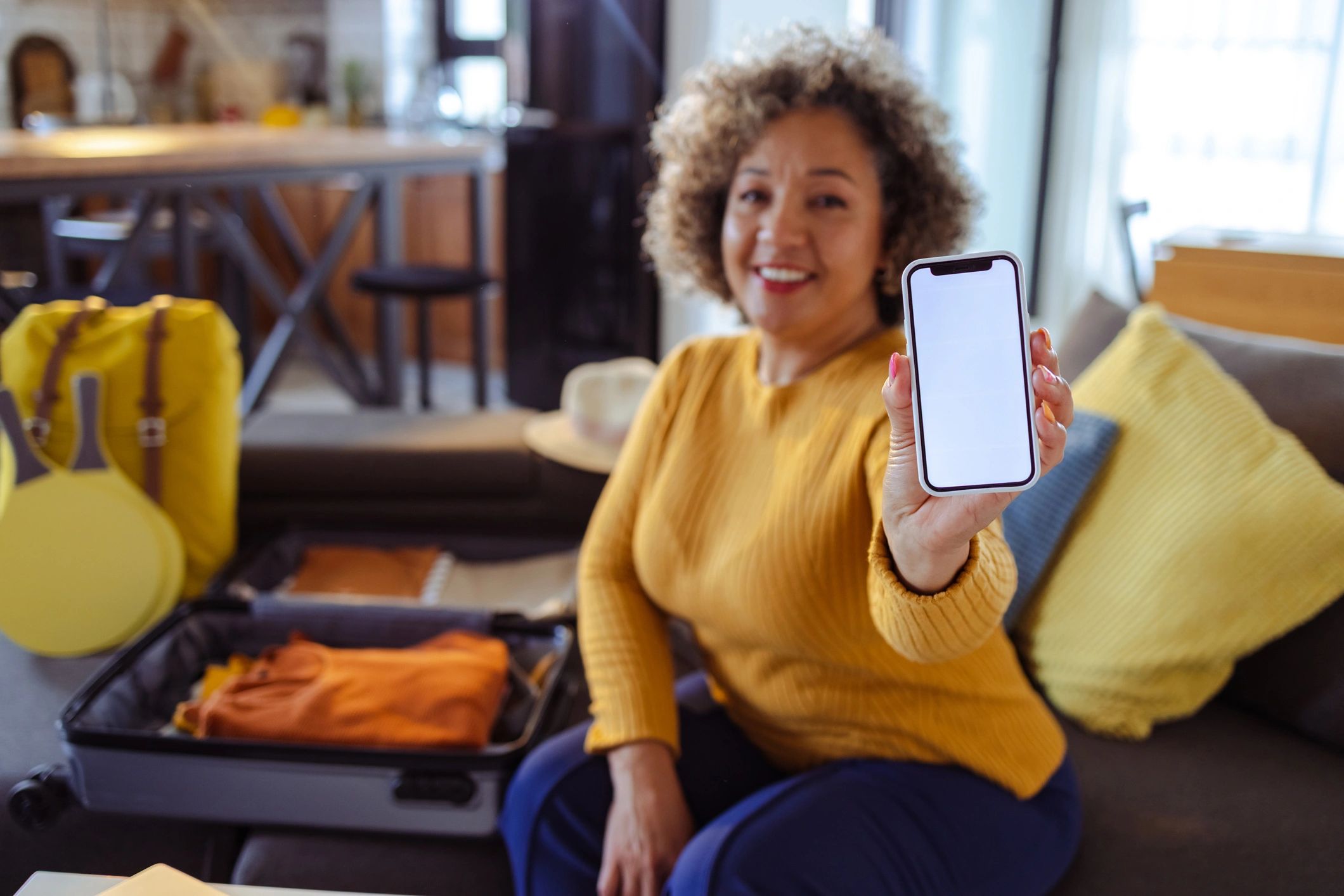 Happy guest using mobile booking app